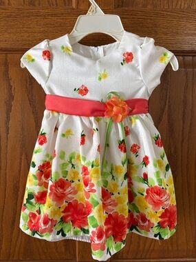 Bonnie Baby White Dress with Coral Sash and Yellow Floral Accents